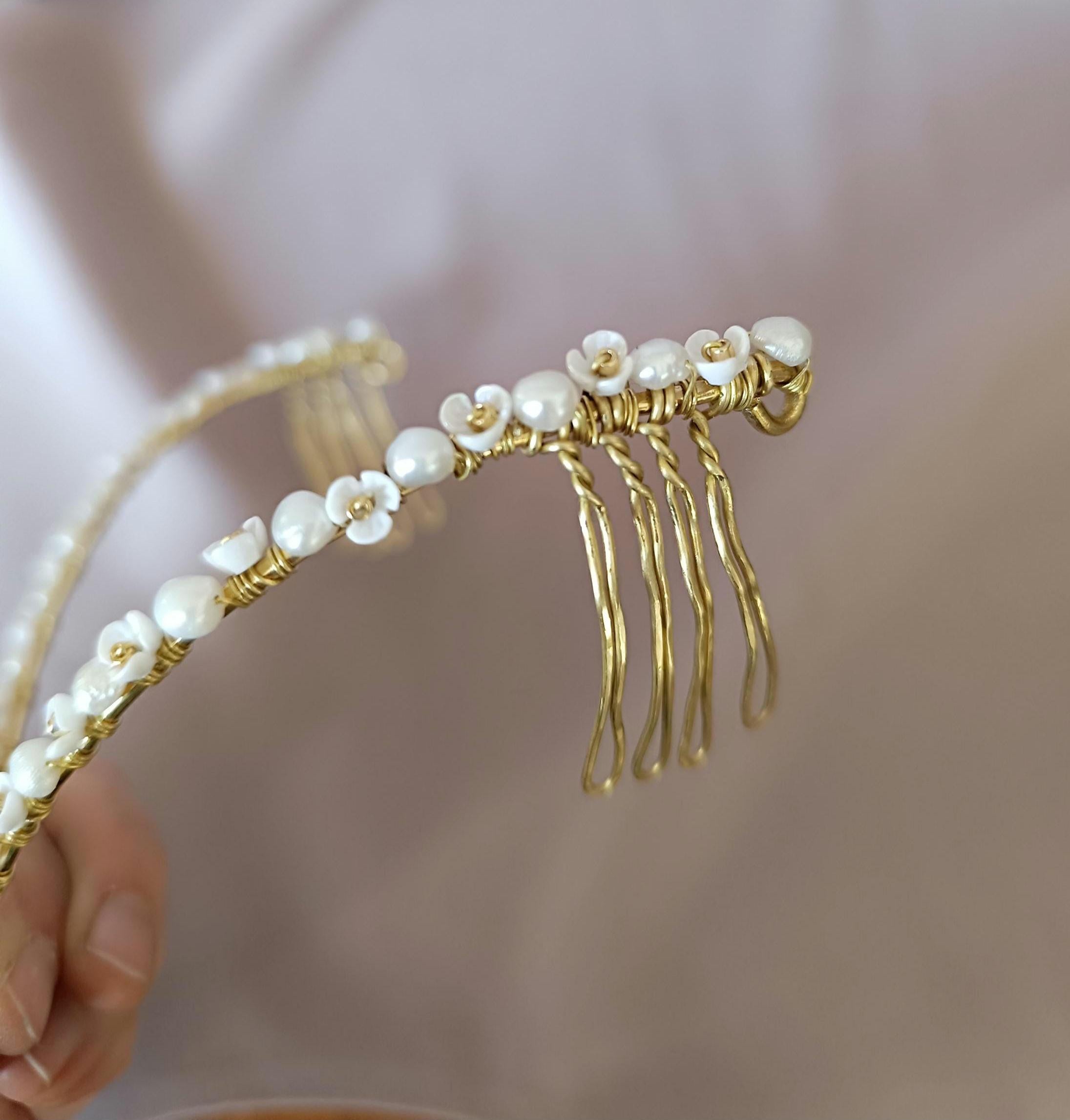 delicate handmade brass tiara with pearls, styled in an elegant twist braid hairstyle