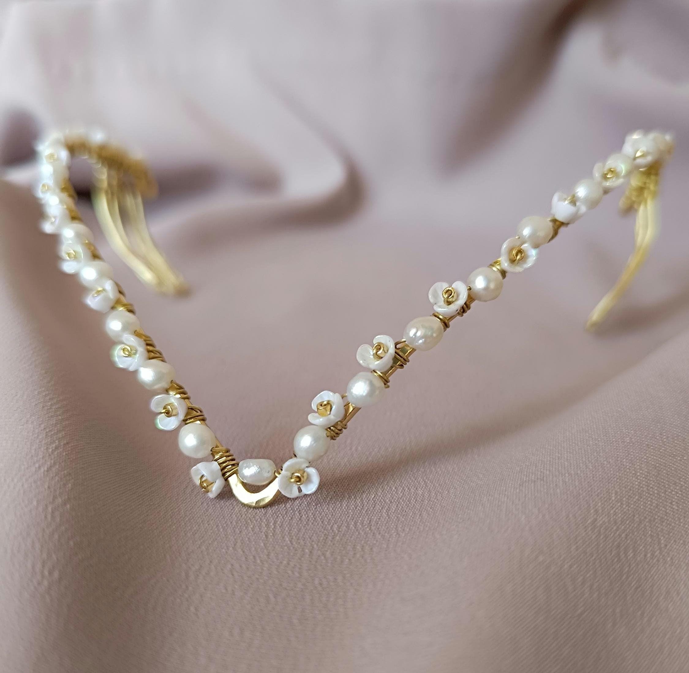 delicate handmade brass tiara with pearls, styled in an elegant twist braid hairstyle