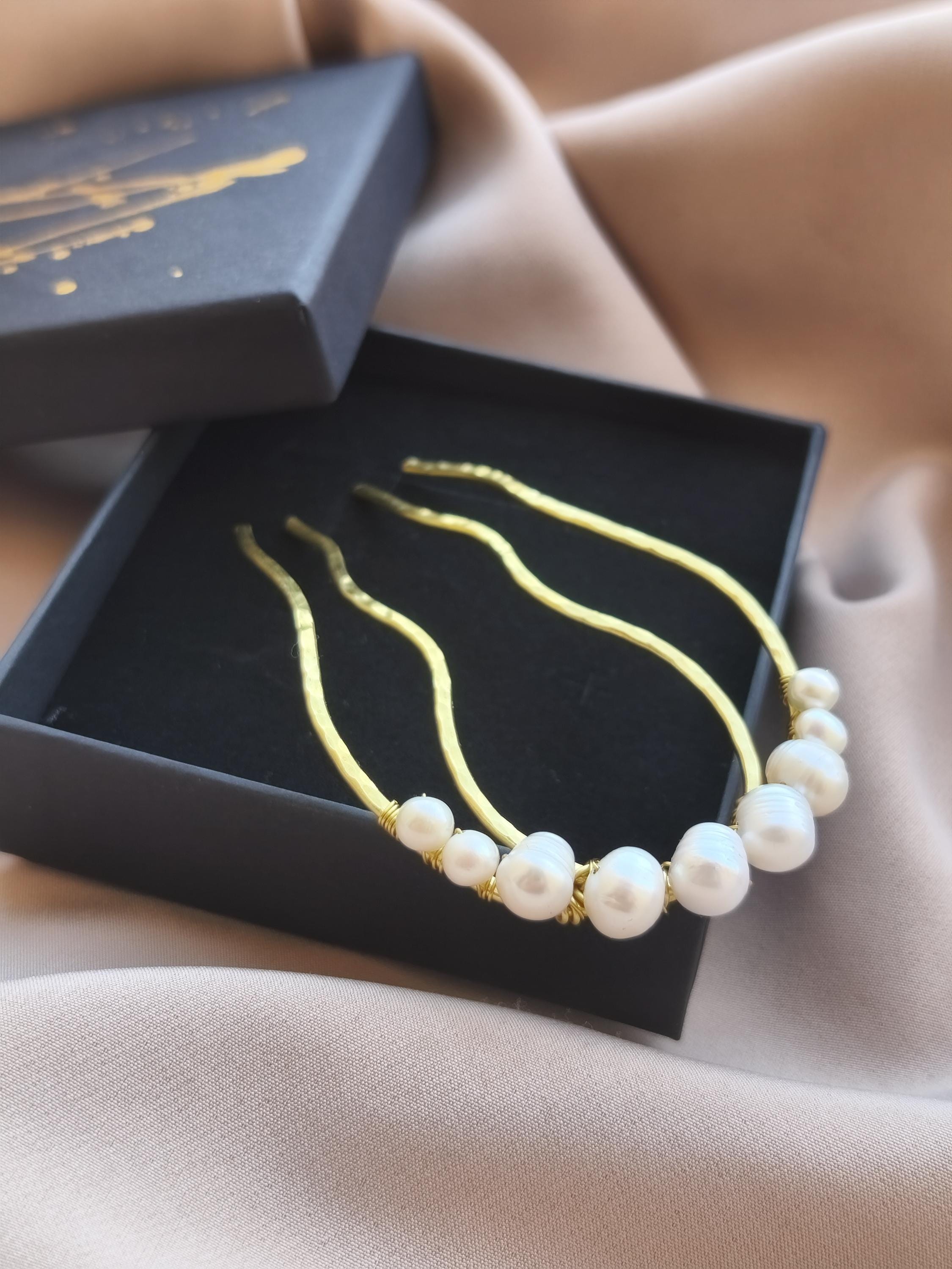 Hand-forged brass and freshwater pearl hair comb