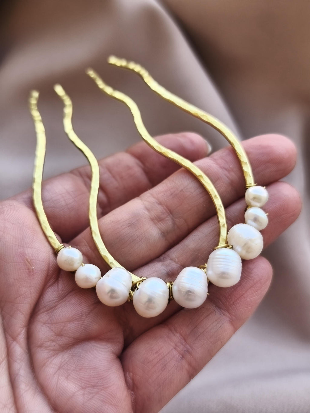 Hand-forged brass and freshwater pearl hair comb